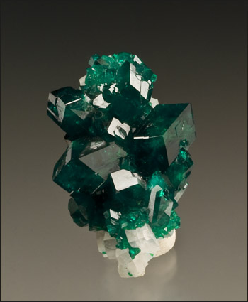 Dioptase on calcite miniature Tsumeb